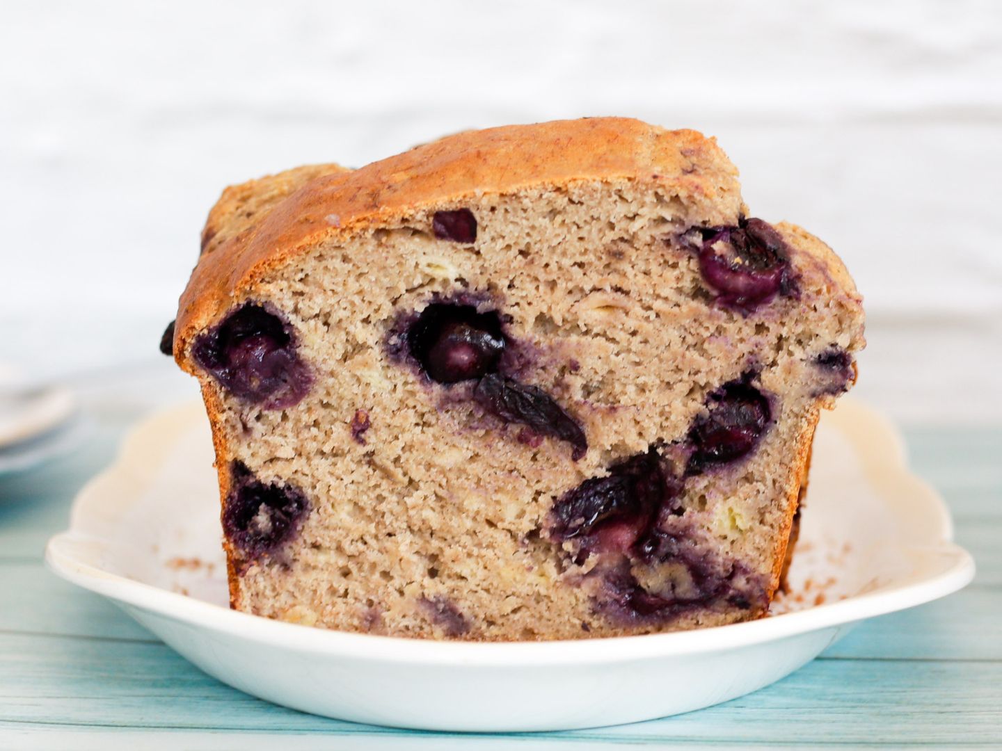 Shows the Vegan Blueberry Banana Bread cut, from the front