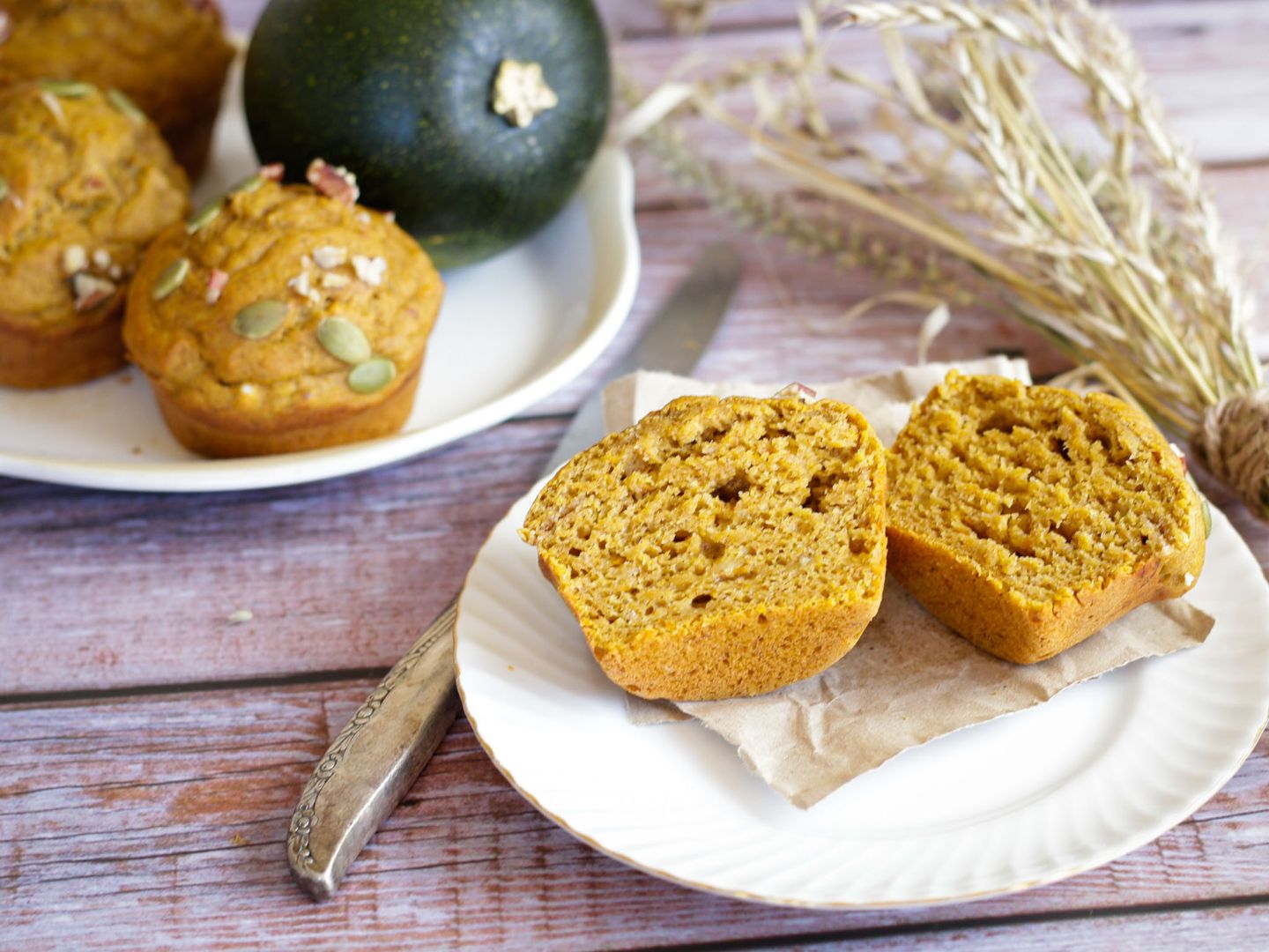 muffin cut in half on a plate